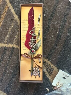 Vintage Red Feather Steampunk Pen with Gold Wing and Gear Accents